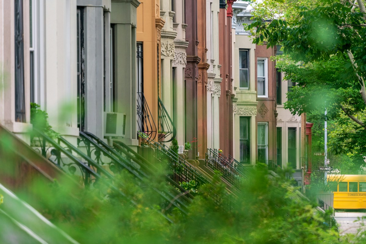 Brooklyn brownstone homes along a tree-lined street